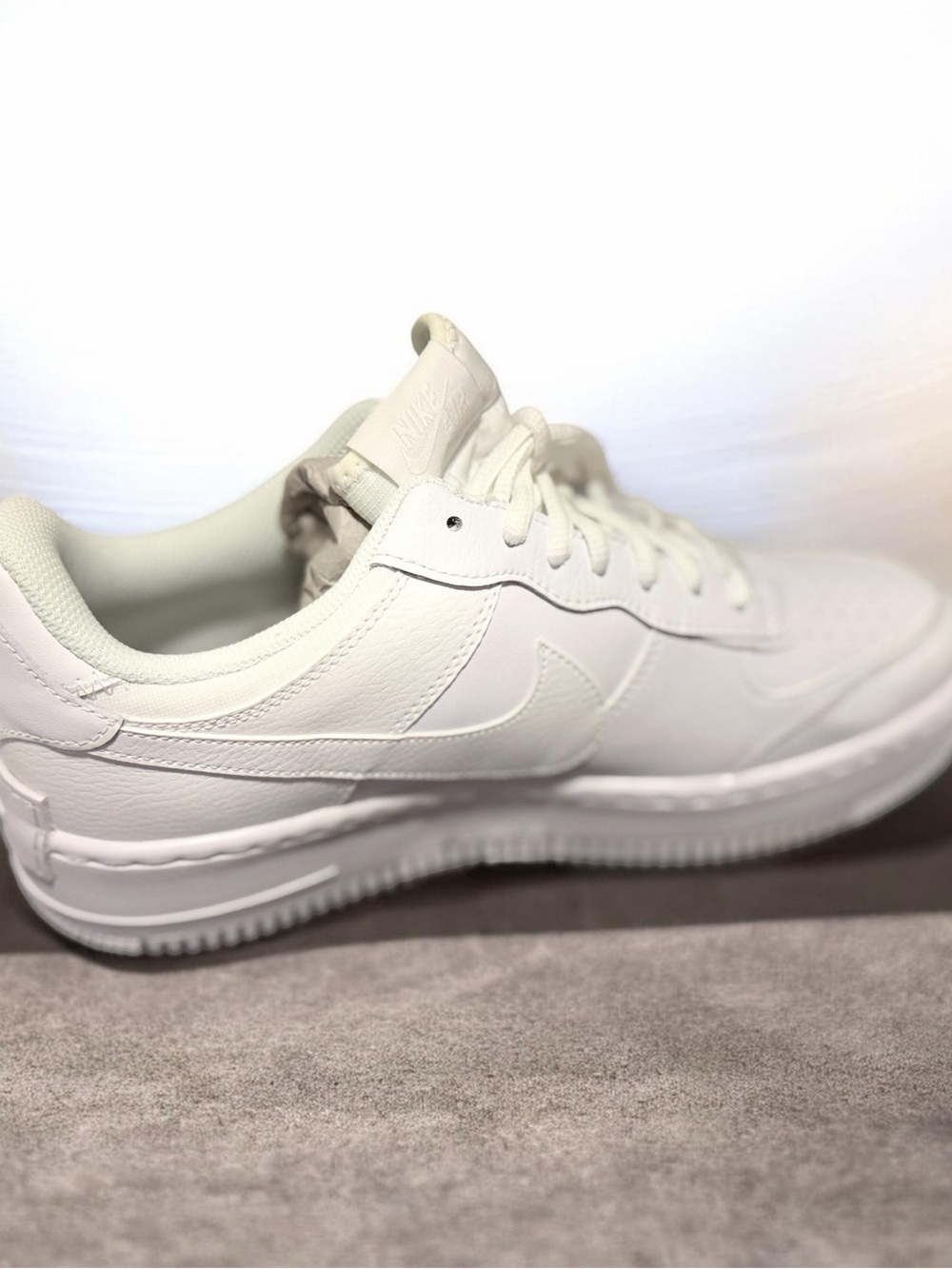 Nike Women’s All-White Leather Low-Top Sneakers
